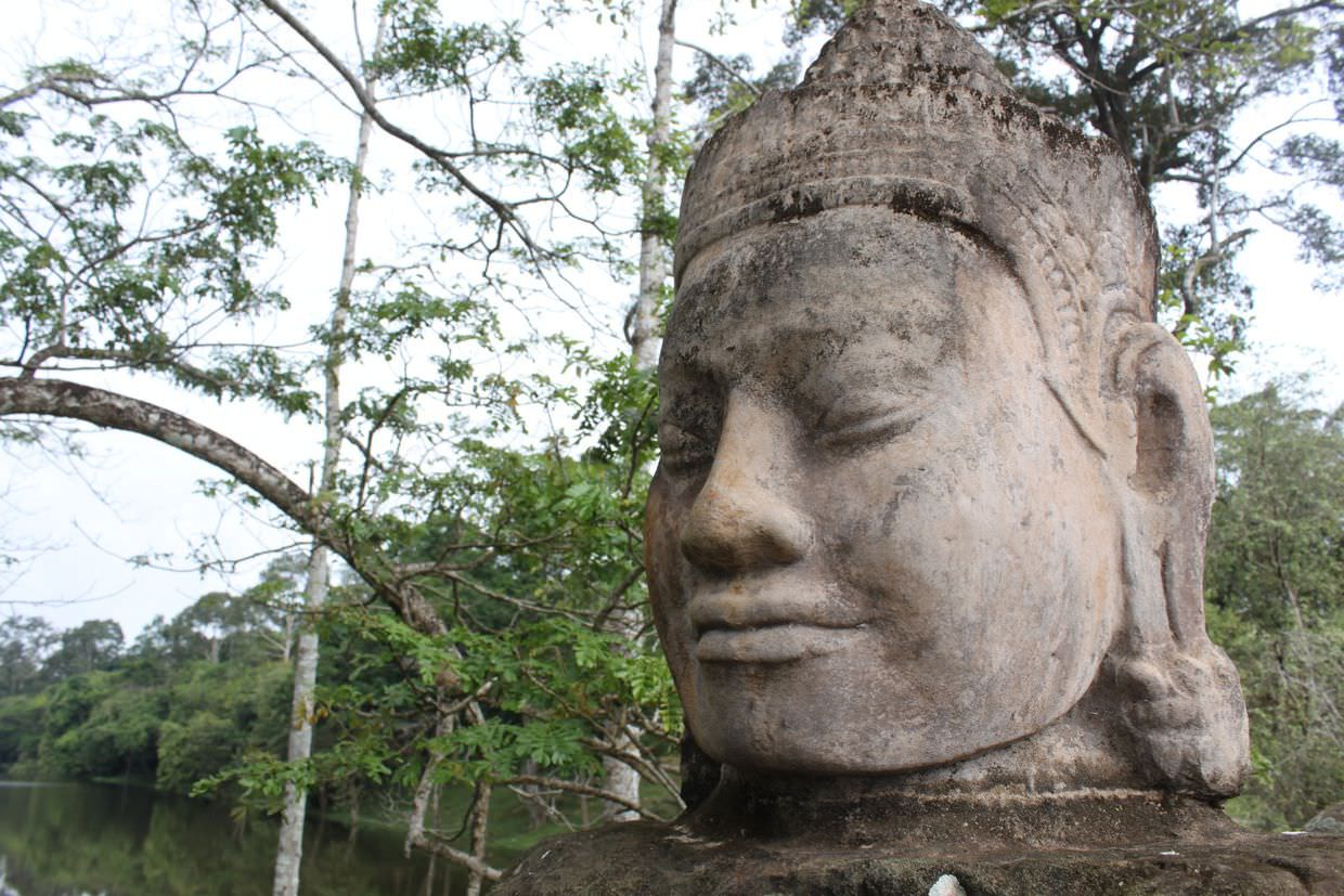 A guardian god at the south gate of Angkor Thom