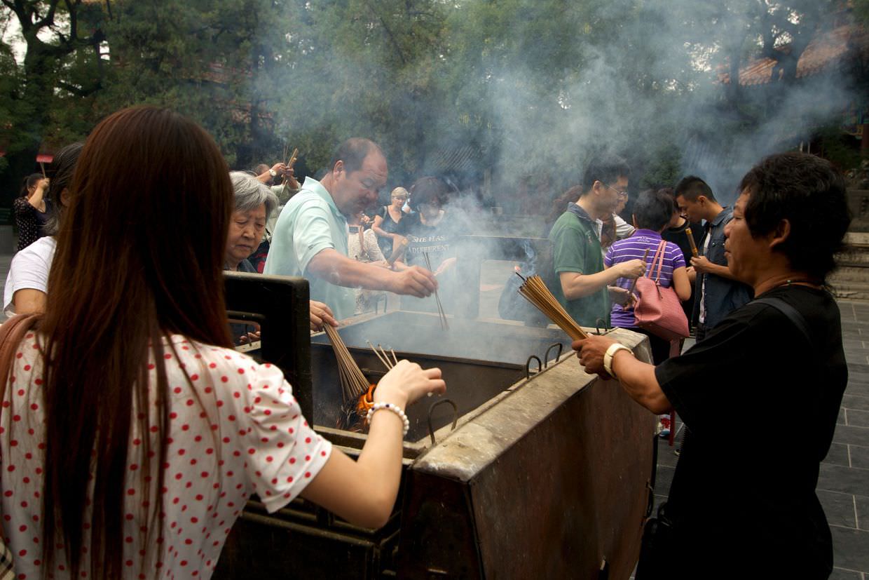 Burning incense at Lama temple, Beijing
