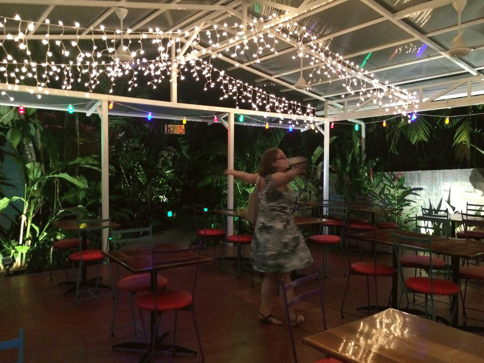 Samantha dancing under the fairy lights