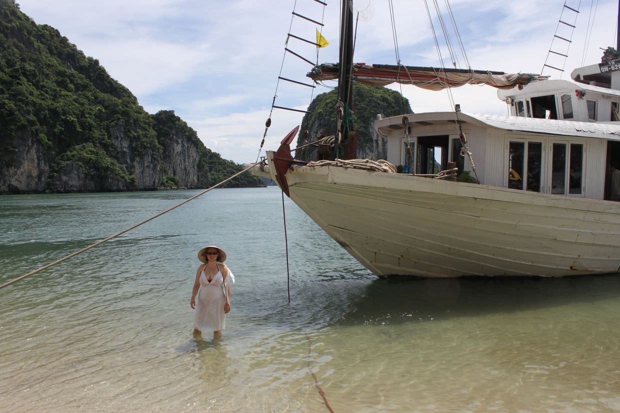 Samantha and our boat, on our deserted island