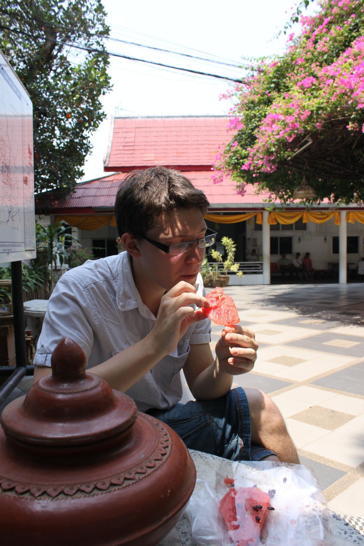 Paul eating watermelon at Doi Suthep