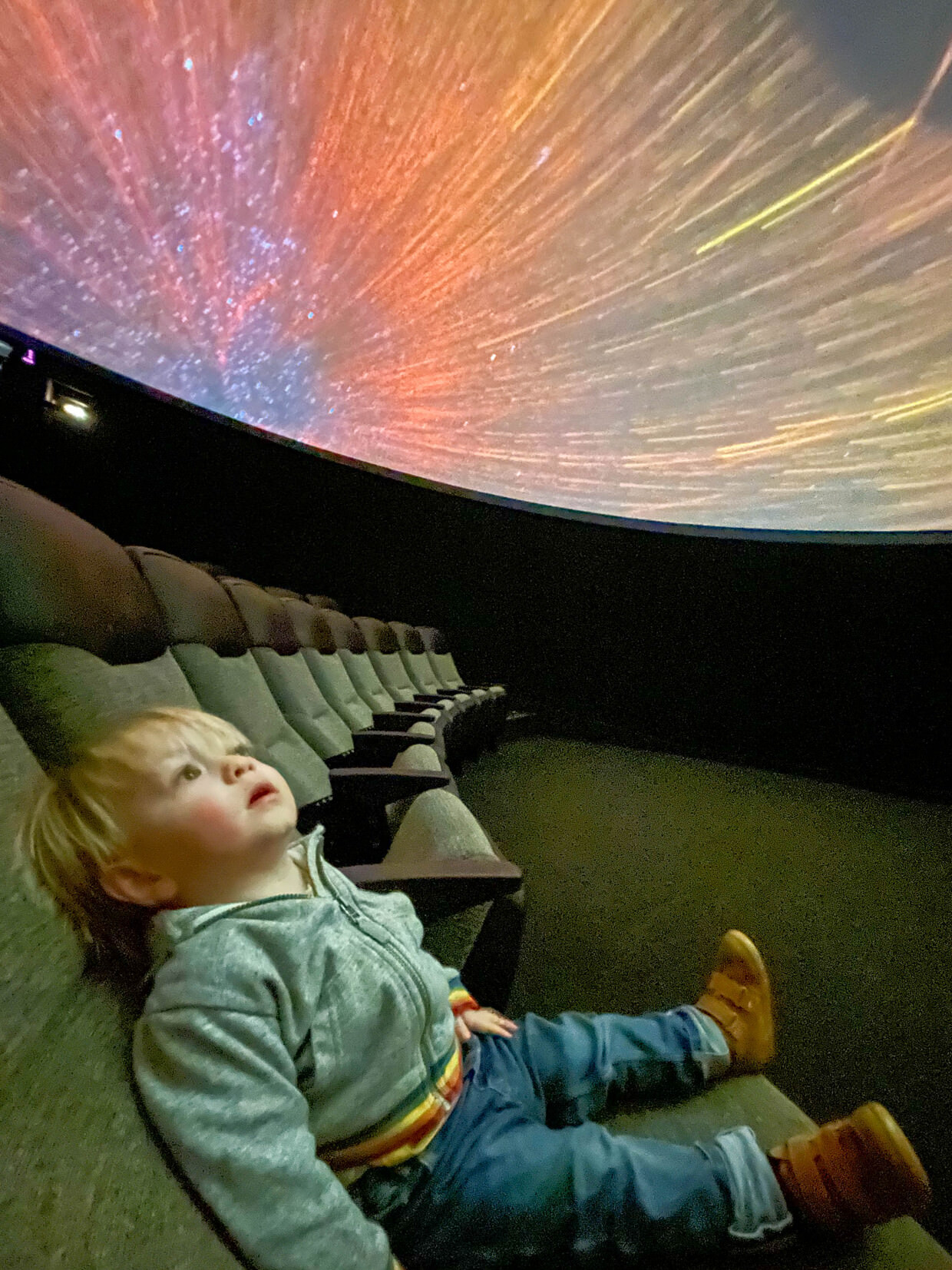 Forrest in awe at the Aurora planetarium show