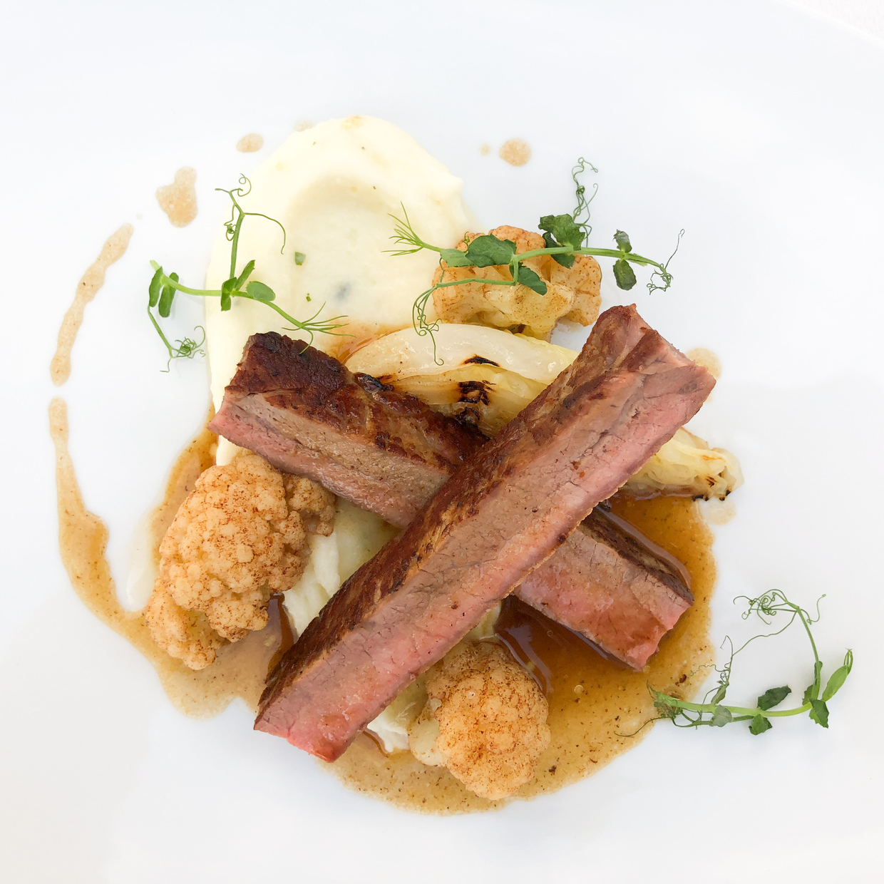 Striploin, potato purée, ‘cabbage from green egg’, cauliflower with brown butter