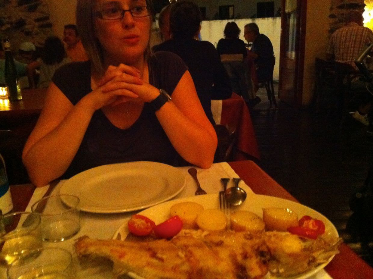 Samantha at Can Tito, admiring the passing plates of food
