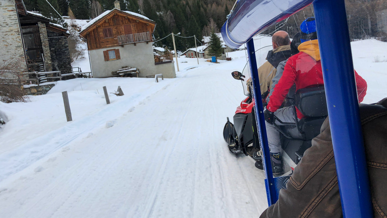 Speeding home on the snowmobile